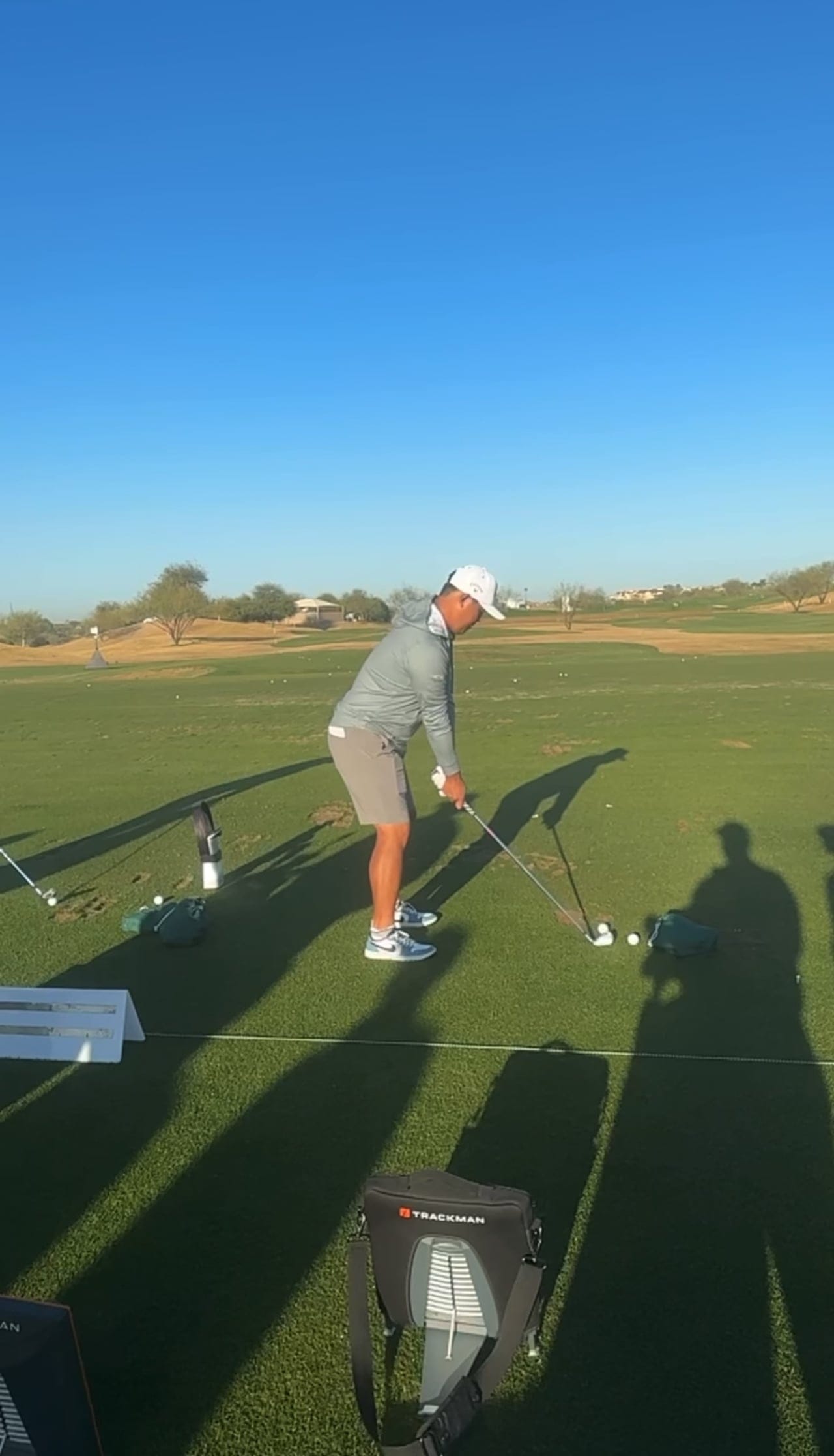 Si Woo Kim mid-swing